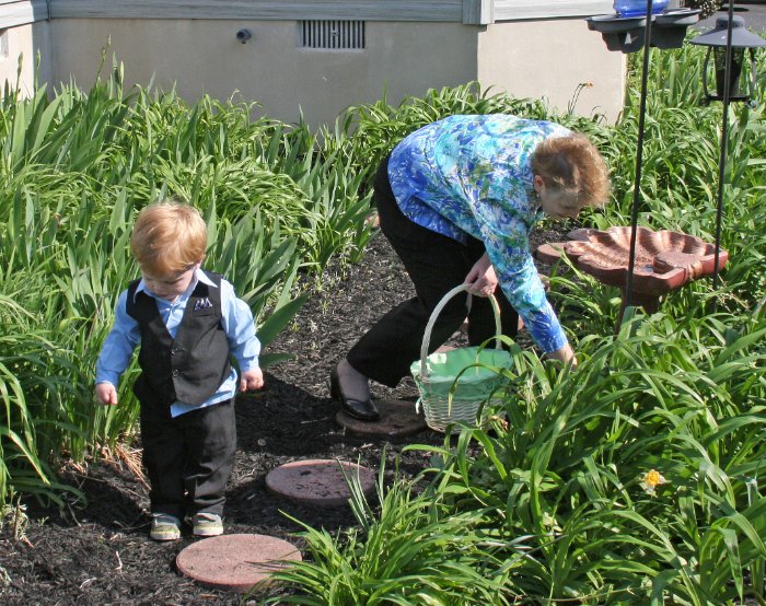 Grammy and Jacob hunt for eggs